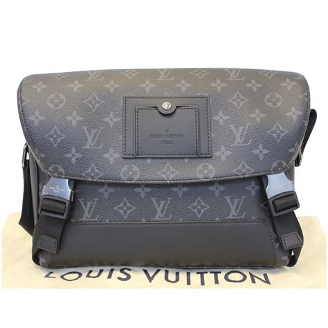 LOUIS VUITTON Monogram Eclipse Voyager PM .